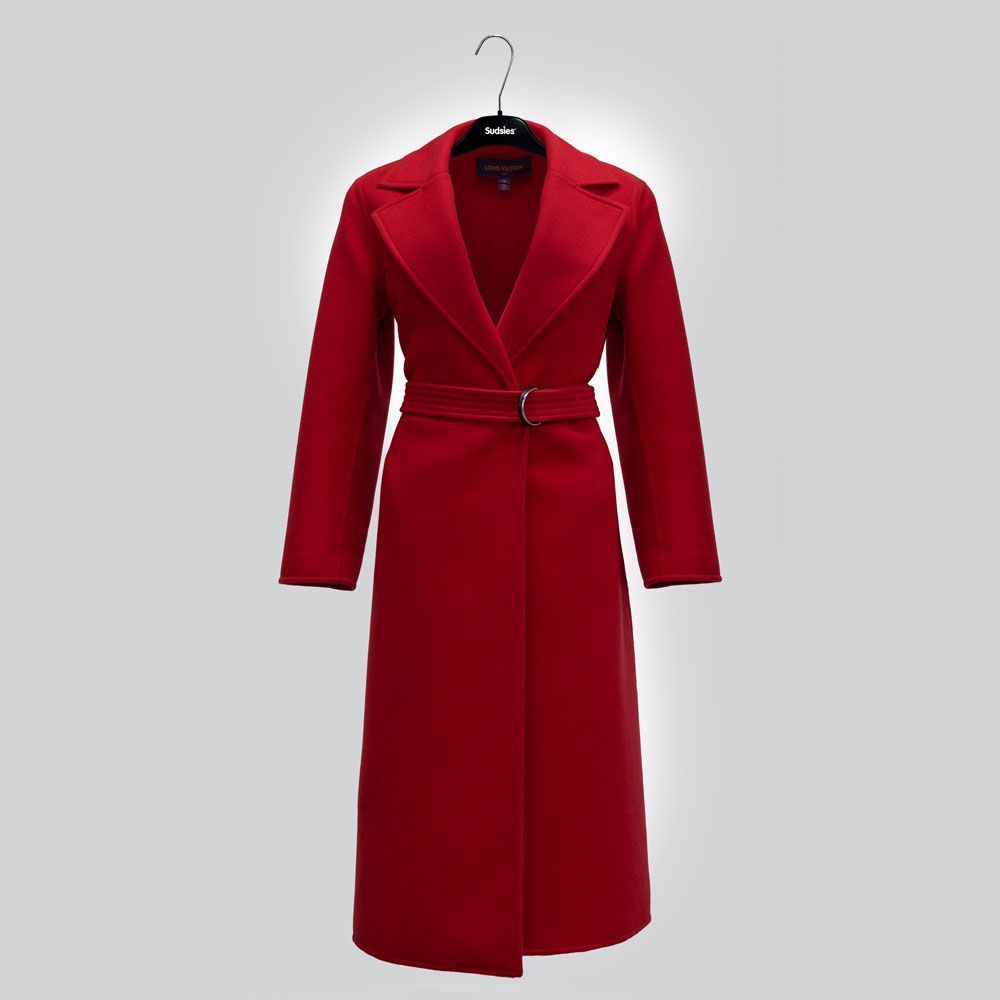 Bold red wool coat on black Sudsies hanger with belt detail